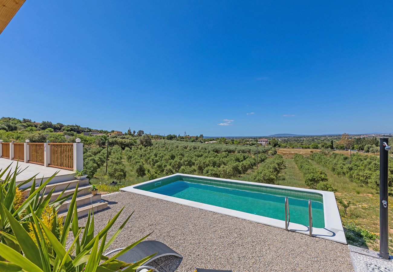 Pool und Panorama der Finca Son Catlar in Inca